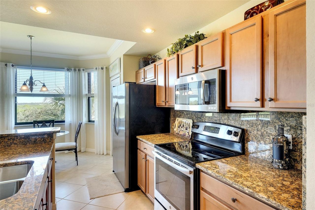 7121 River Hammock Drive, Unit 303, Bradenton, FL 34212 Photo