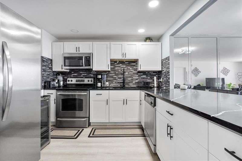 427 Golden Isles Drive, Unit 16H, Hallandale Beach, FL 33009 Photo