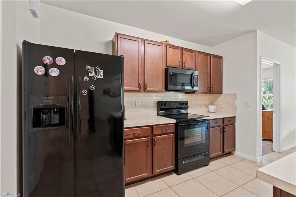 10564 Canal Brook Ln, Lehigh Acres, FL 33936 Photo