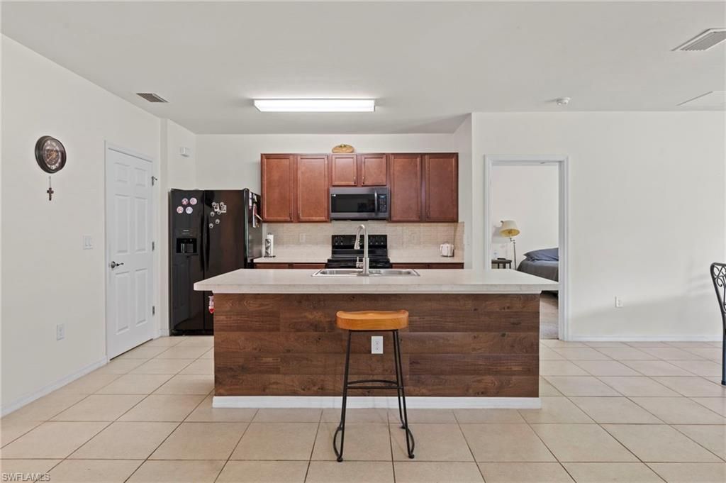 10564 Canal Brook Ln, Lehigh Acres, FL 33936 Photo