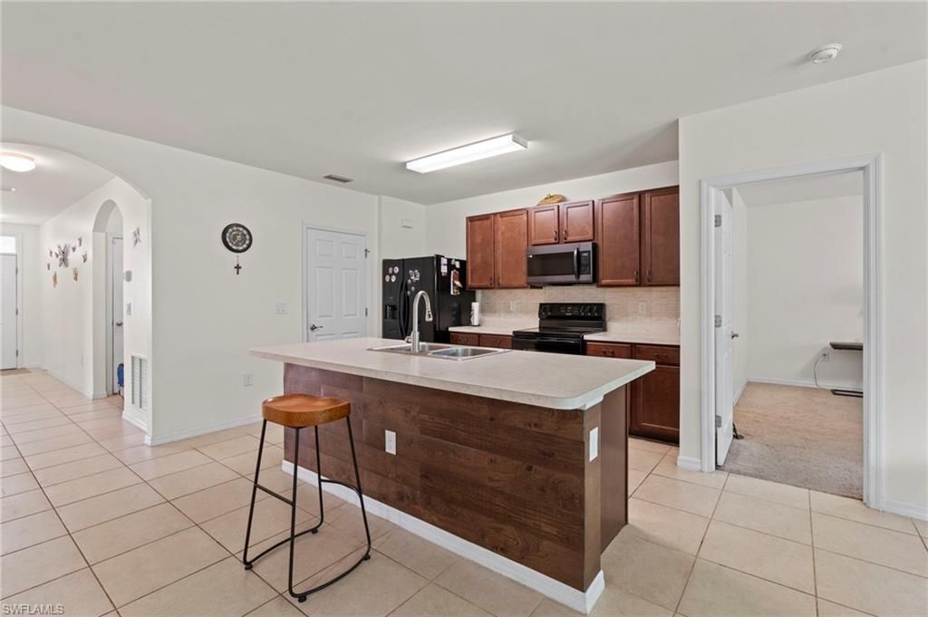 10564 Canal Brook Ln, Lehigh Acres, FL 33936 Photo