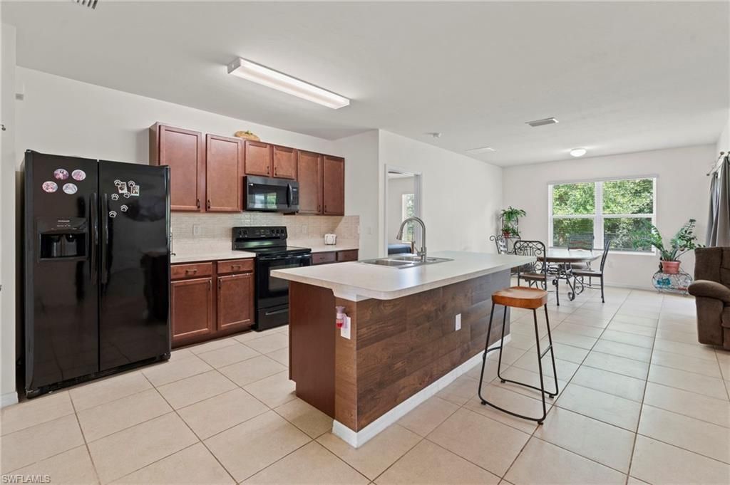 10564 Canal Brook Ln, Lehigh Acres, FL 33936 Photo