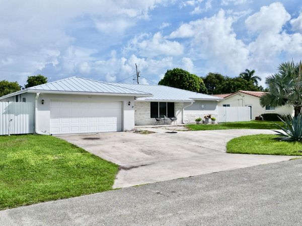 1861 Caribbean Road W, Lake Clarke Shores, FL 33406