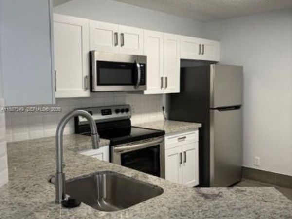 8701 Wiles Rd, Unit 103, Coral Springs, FL 33067