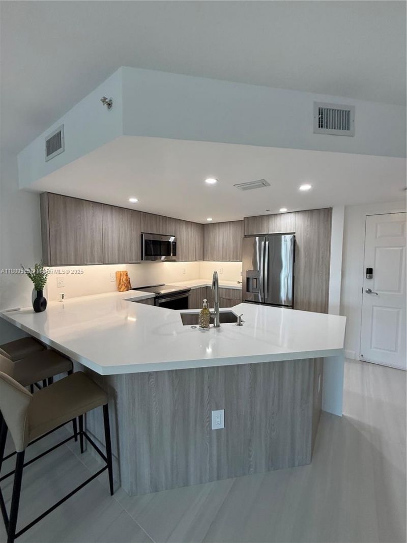 201 Golden Isles Dr, Unit 302, Hallandale Beach, FL 33009 Photo