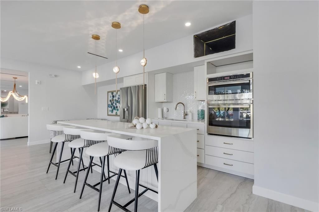 1 Bluebill Ave, Unit 410, Naples, FL 34108 Photo