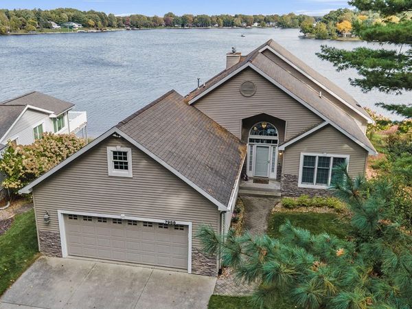 7988 Island Court, Canadian Lakes, MI 49346