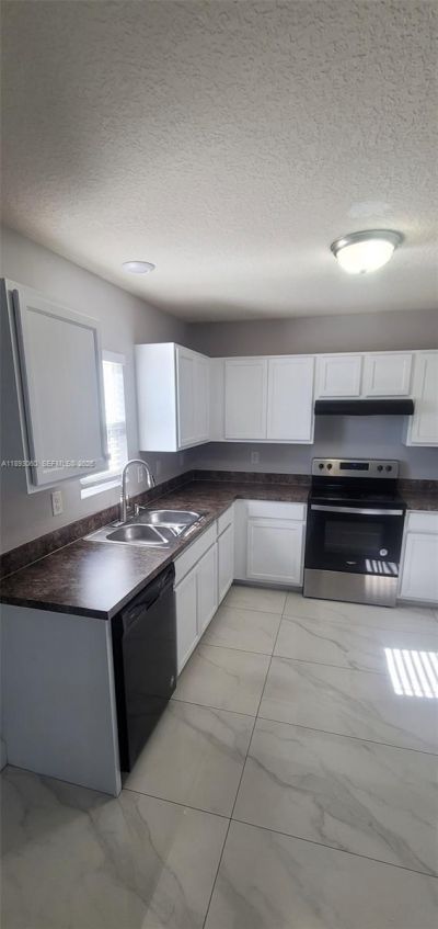 1977 SE Floresta Dr, Port Saint Lucie, FL 34983 Photo