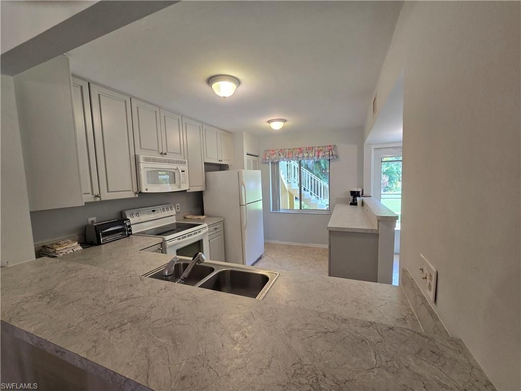 5622 Woodmere Lake Cir, Unit B102, Naples, FL 34112 Photo