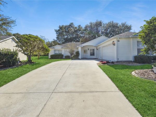 4936 SAWGRASS LAKE CIRCLE, LEESBURG, FL 34748