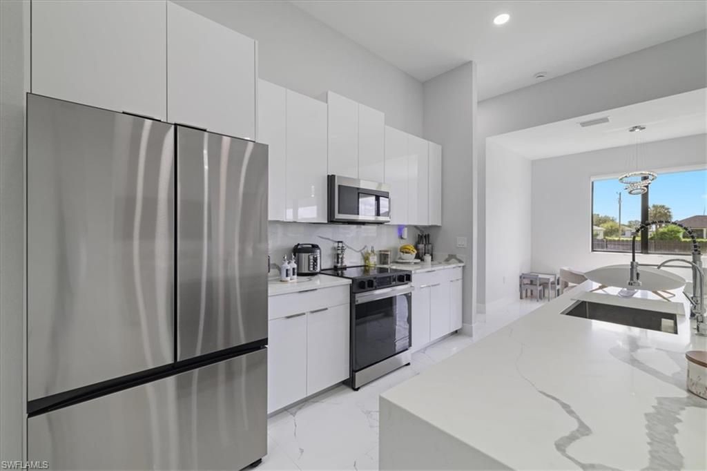 1310 NW 10th Ter, Cape Coral, FL 33993 Photo
