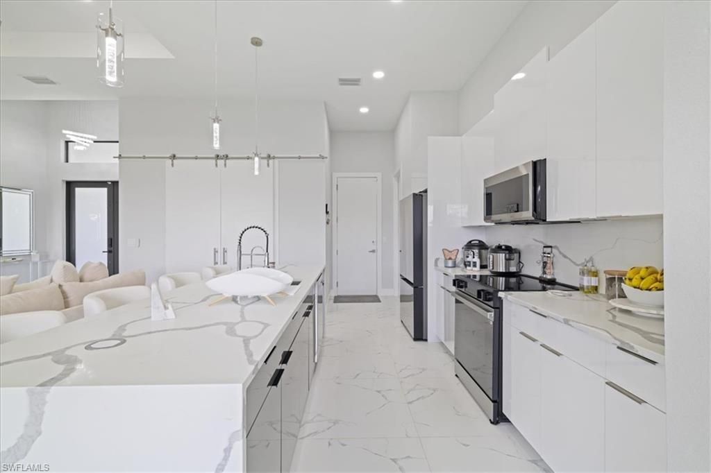 1310 NW 10th Ter, Cape Coral, FL 33993 Photo