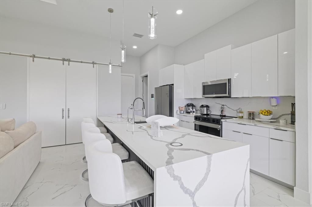 1310 NW 10th Ter, Cape Coral, FL 33993 Photo