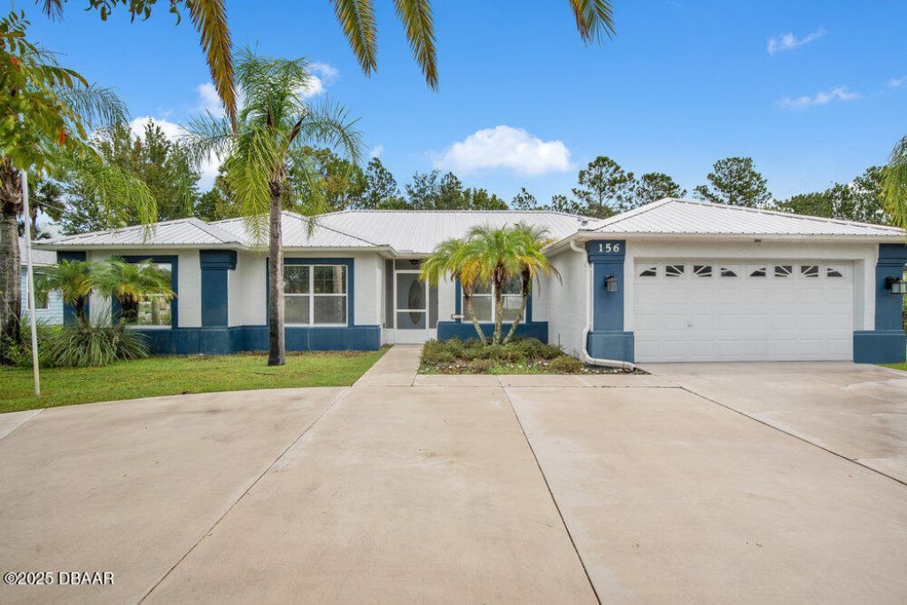 156 Bird Of Paradise Drive, Palm Coast, FL 32137 Main Photo