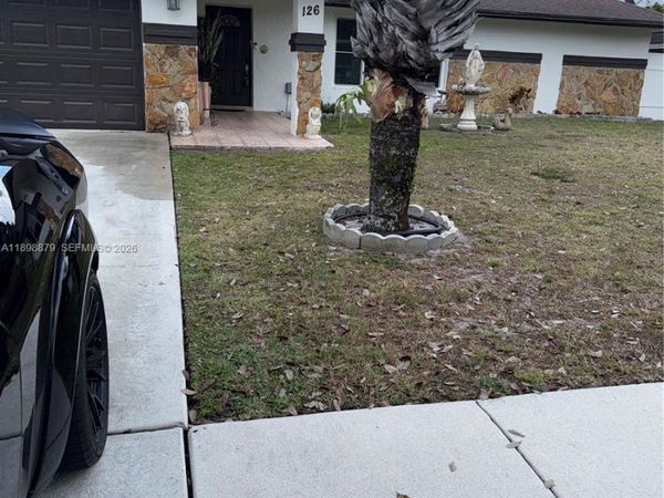 126 Sunflower Cir, Royal Palm Beach, FL 33411