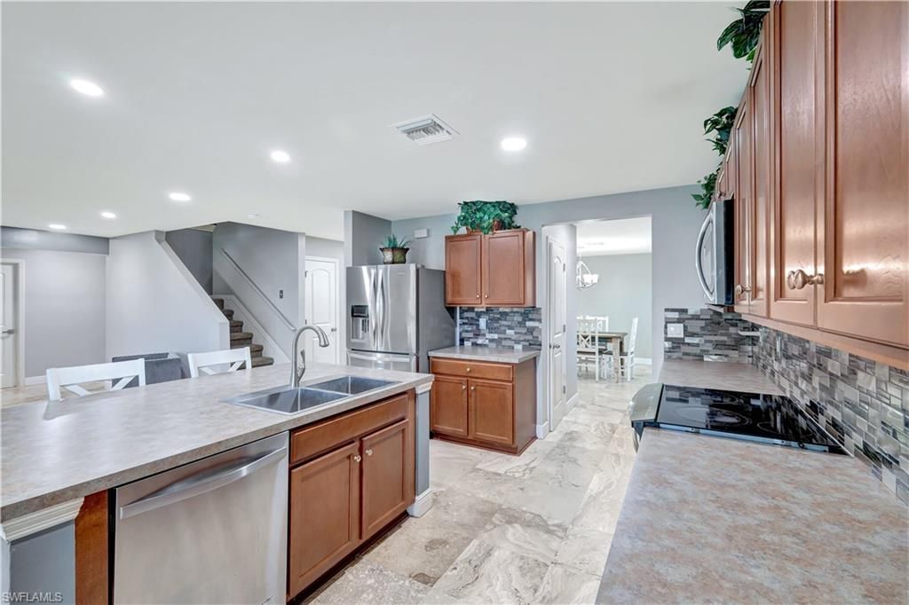 10337 Canal Brook Ln, Lehigh Acres, FL 33936 Photo