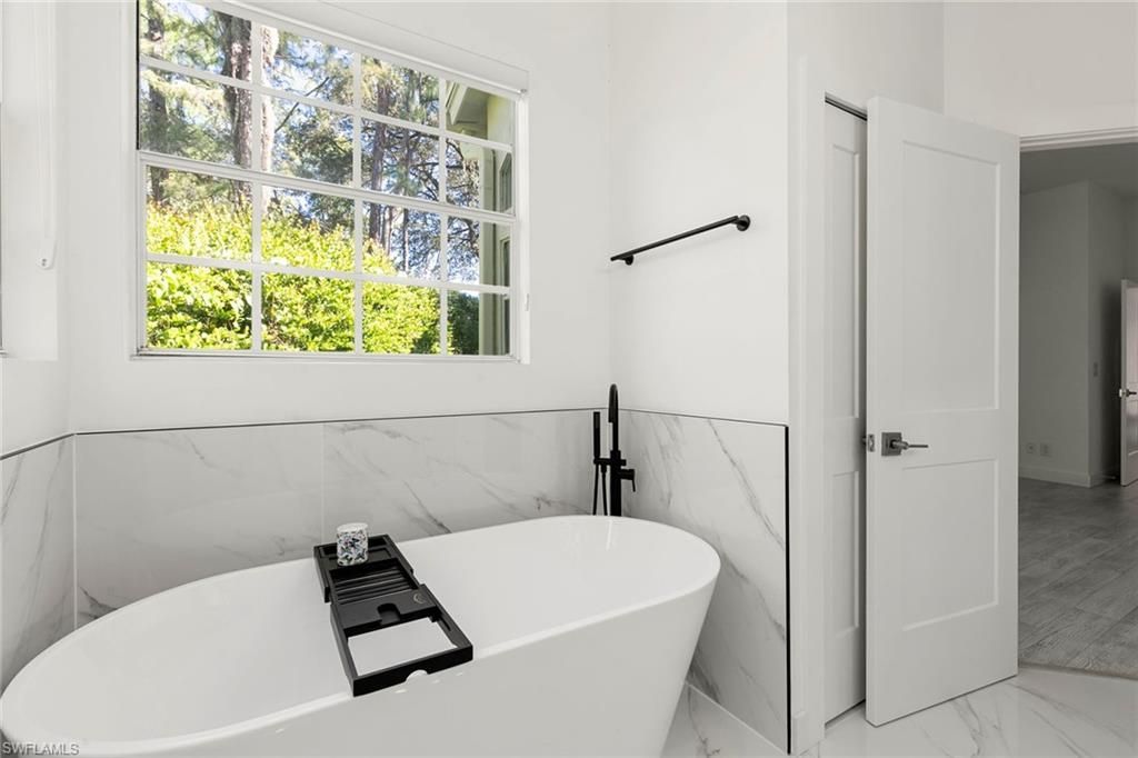 101 Amblewood Ln, Unit 1-104, Naples, FL 34105 Photo