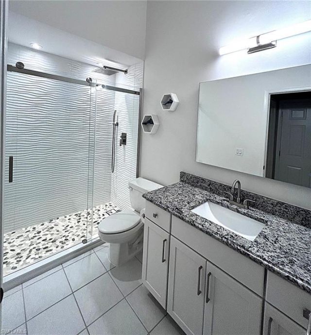 102 Palm Frond Ct, Naples, FL 34104 Photo