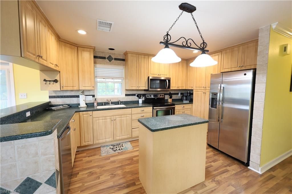 8642 Whispering Pines Dr, Saint James City, FL 33956 Photo