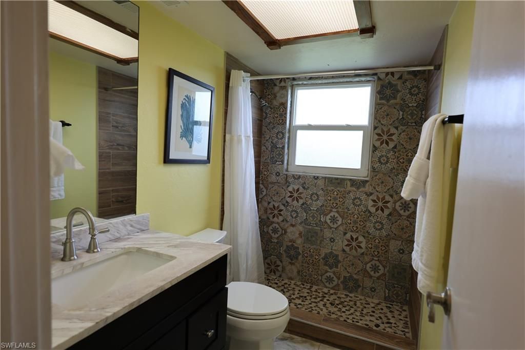 8642 Whispering Pines Dr, Saint James City, FL 33956 Photo