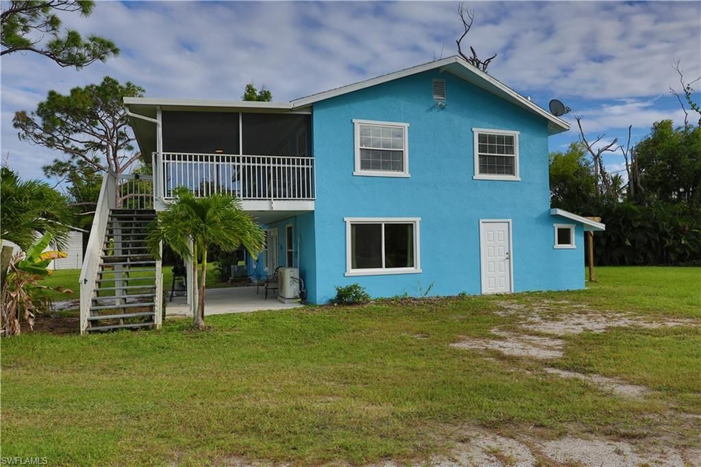 8642 Whispering Pines Dr, Saint James City, FL 33956 Photo