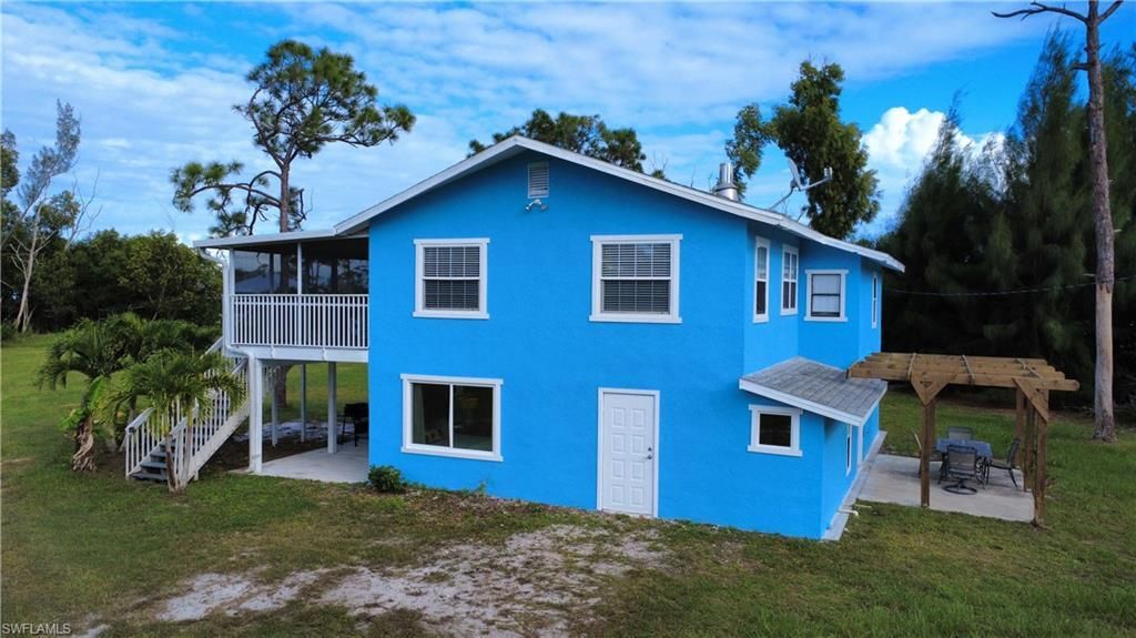 8642 Whispering Pines Dr, Saint James City, FL 33956 Photo