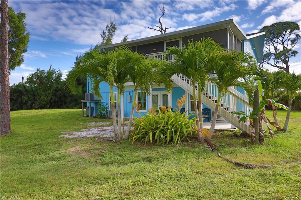 8642 Whispering Pines Dr, Saint James City, FL 33956 Photo