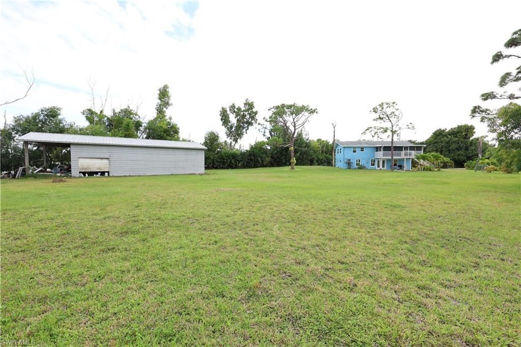 8642 Whispering Pines Dr, Saint James City, FL 33956 Photo