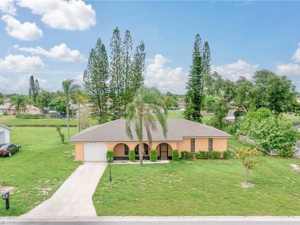 1438 CAYWOOD CIR N, LEHIGH ACRES, FL 33936