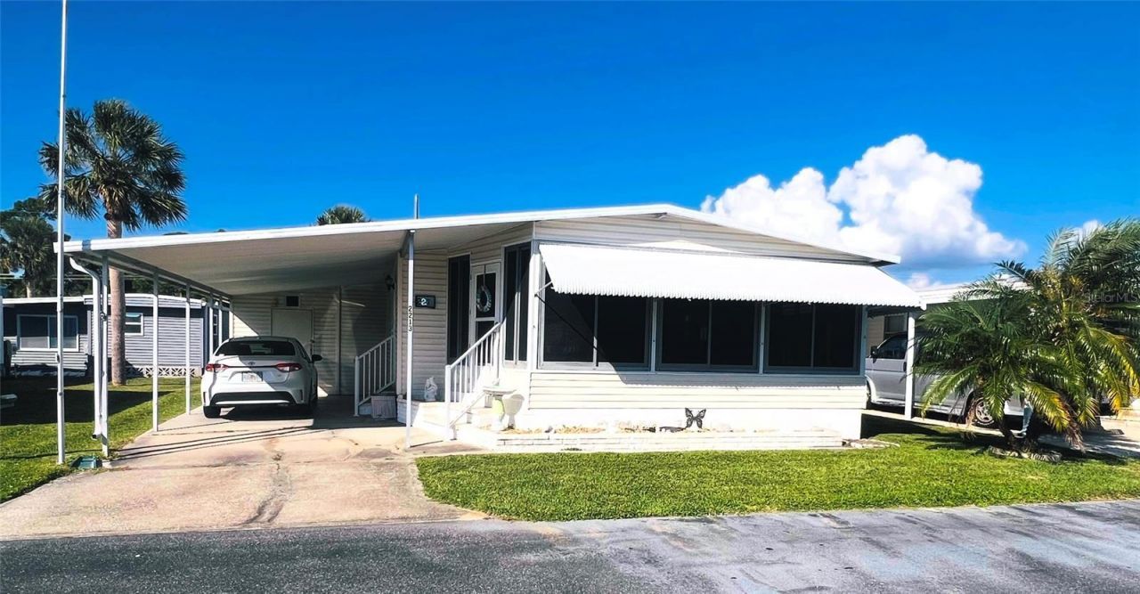 2213 Piazza Drive, Unit 128, Sarasota, FL 34238 Main Photo