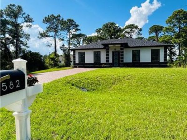 582 Eisenhower BLVD, LEHIGH ACRES, FL 33974