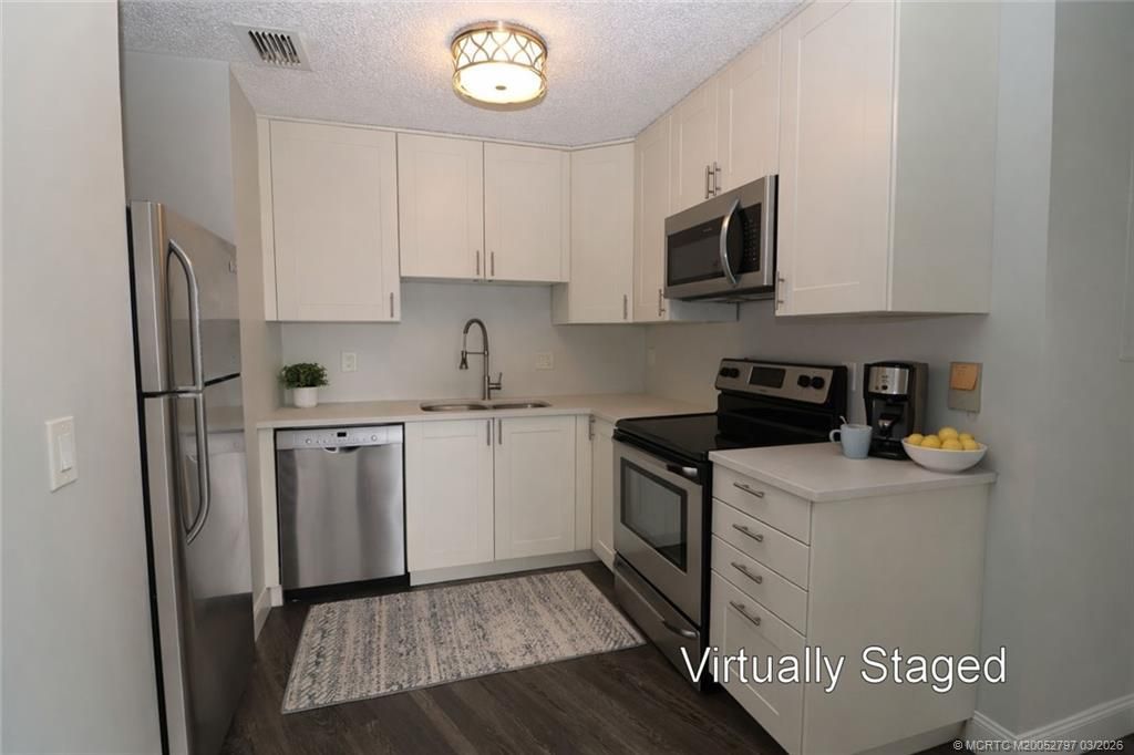 2083 NE Collins Circle, Unit 8-90, Jensen Beach, FL 34957 Photo