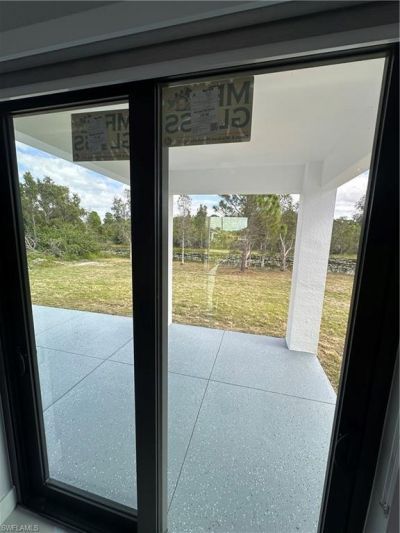 569 Bourse Cir, Lehigh Acres, FL 33974 Photo