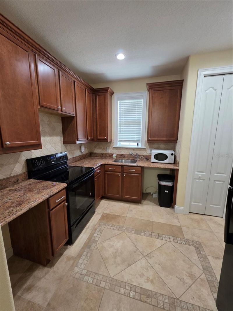 7013 Five Oaks Drive, Harmony, FL 34773 Photo