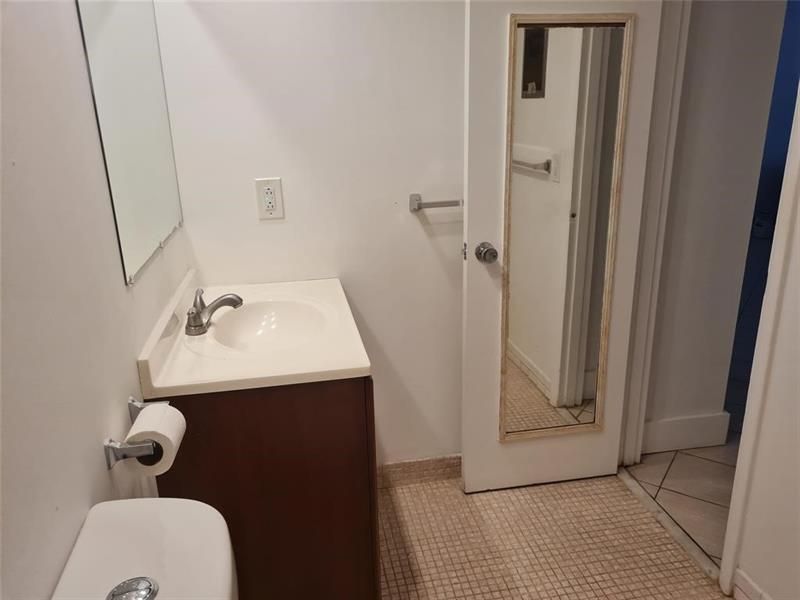 300 Golden Isles Drive, Unit 104, Hallandale Beach, FL 33009 Photo