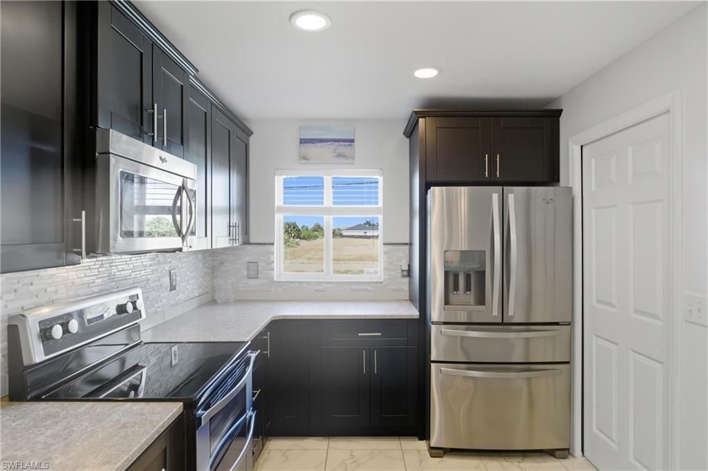 1528 NW 17th Ter, Cape Coral, FL 33993 Photo