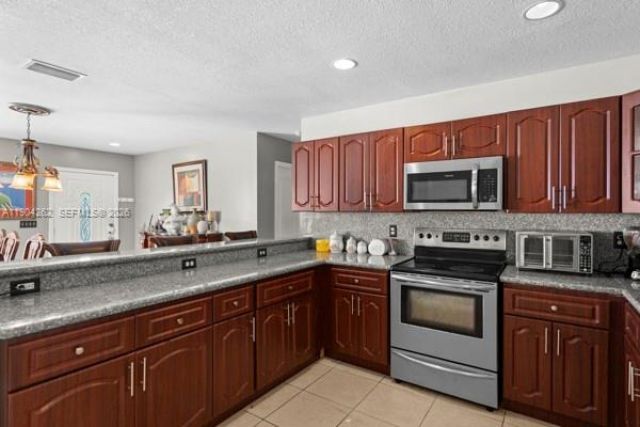 707 SE Karrigan Ter, Port Saint Lucie, FL 34983 Photo