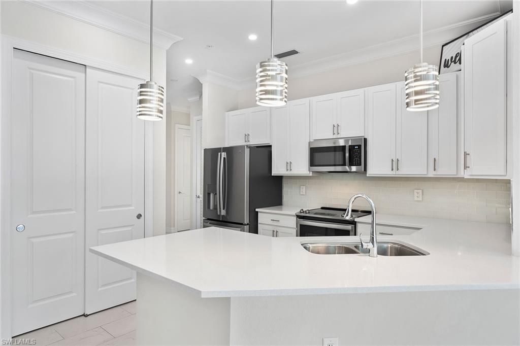 238 Indies Dr E, Unit 201, Naples, FL 34114 Photo