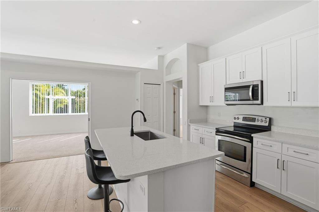 571 Chamonix Ave S, Lehigh Acres, FL 33974 Photo