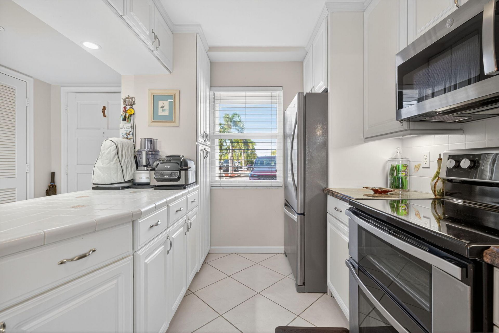 105 Paradise Harbour Boulevard, Unit 102, North Palm Beach, FL 33408 Photo