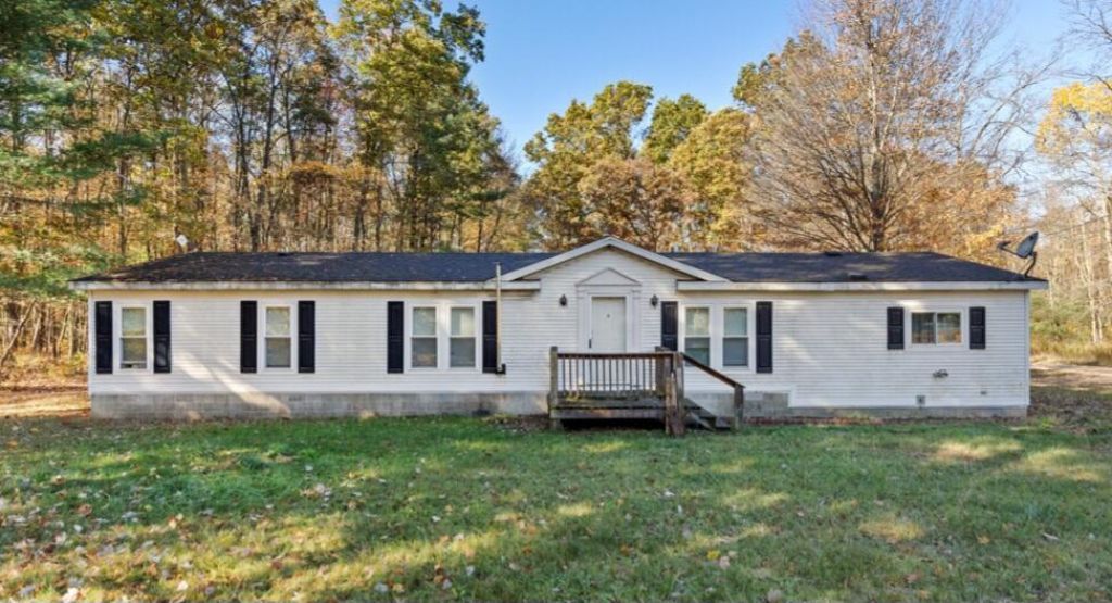 6585 Crystal Lake Rd, Holton, MI 49425 Main Photo