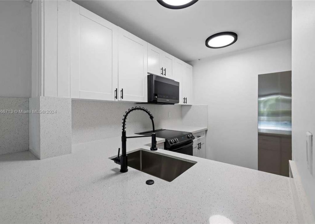 494 NW 165th Street Road, Unit C108, Miami, FL 33169 Photo