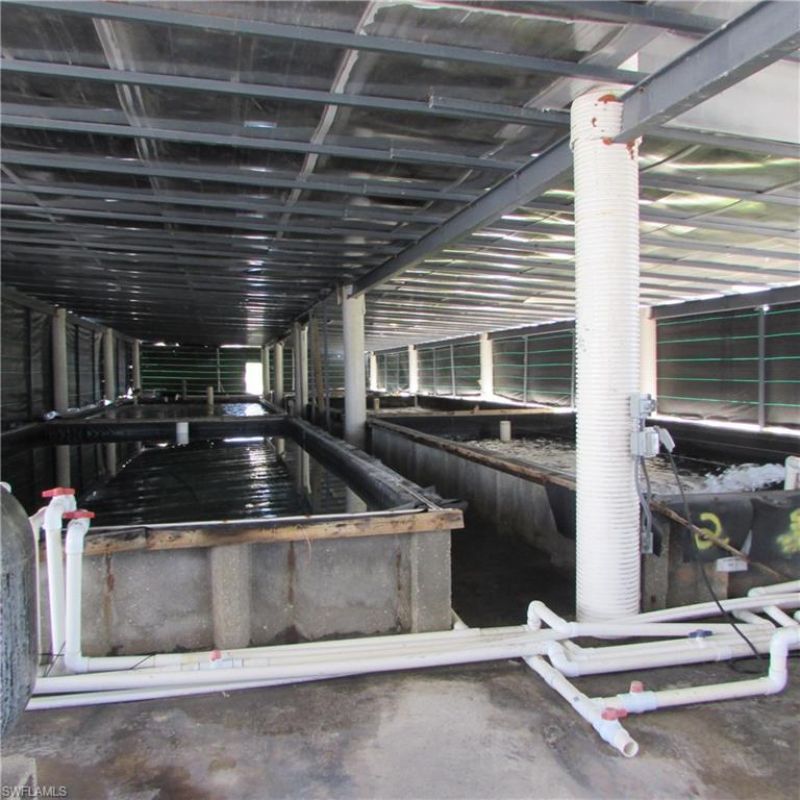 9703 Stringfellow Rd , Saint James City, FL 33956 Photo