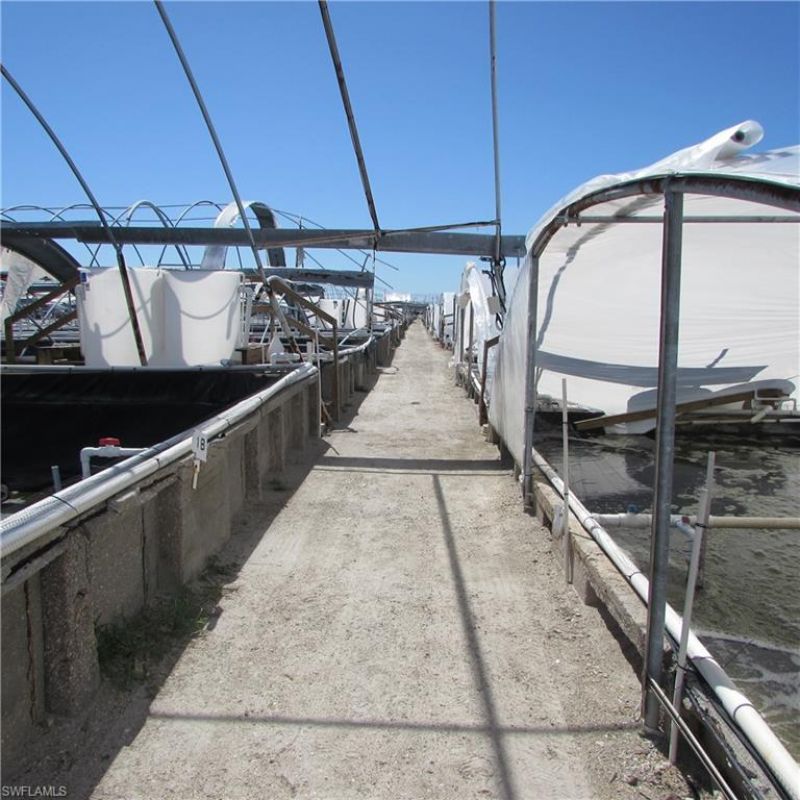 9703 Stringfellow Rd , Saint James City, FL 33956 Photo