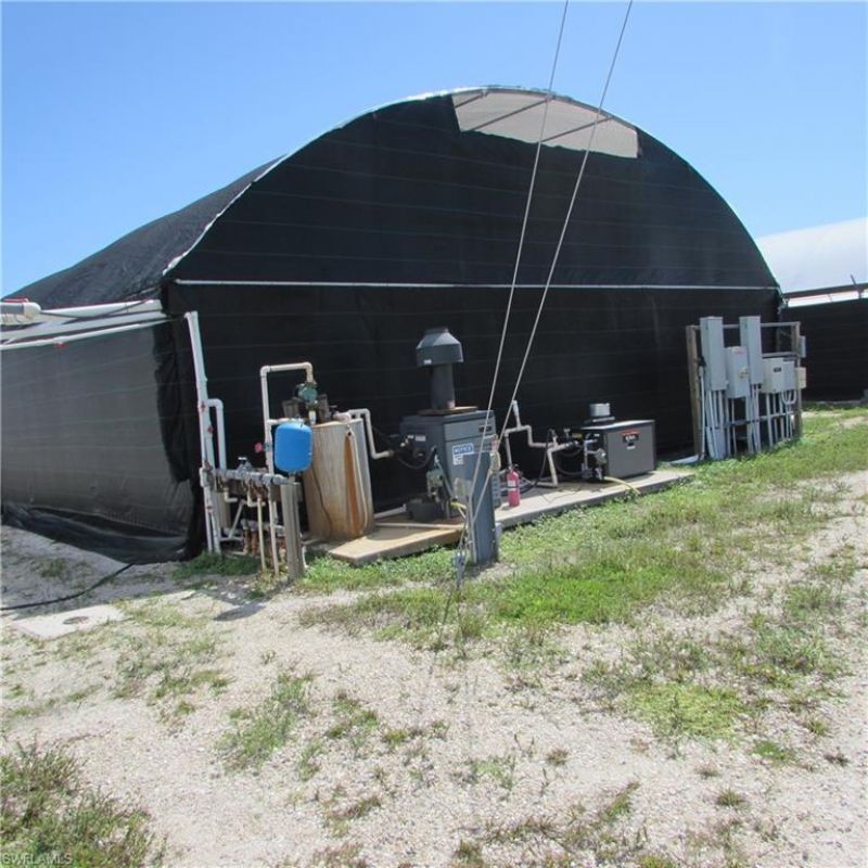 9703 Stringfellow Rd , Saint James City, FL 33956 Photo