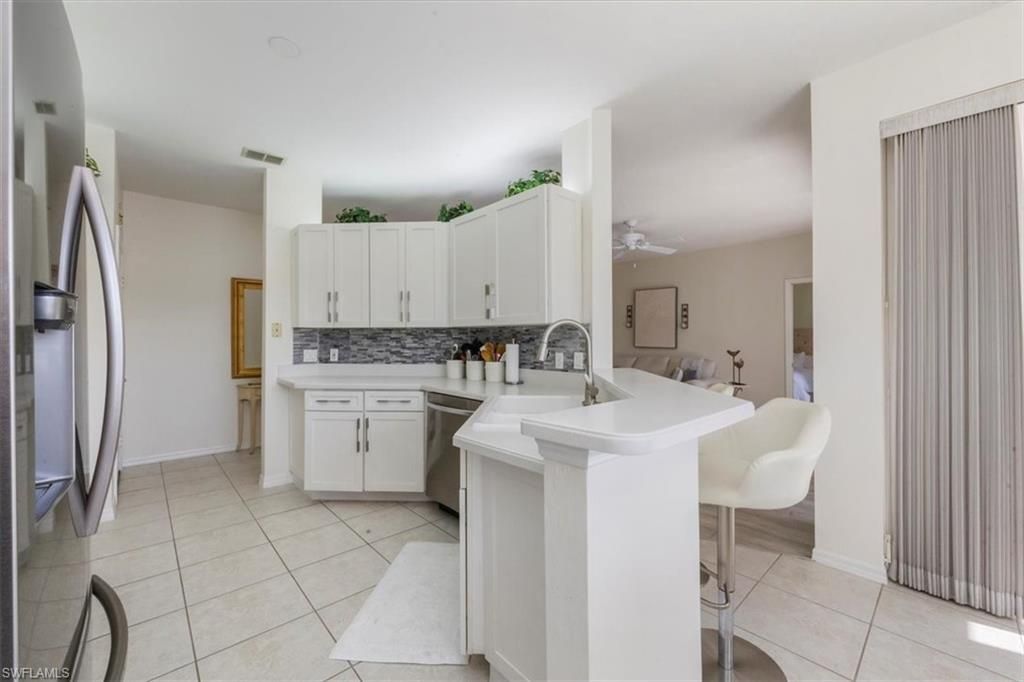 5657 Whisperwood Blvd, Unit 202, Naples, FL 34110 Photo