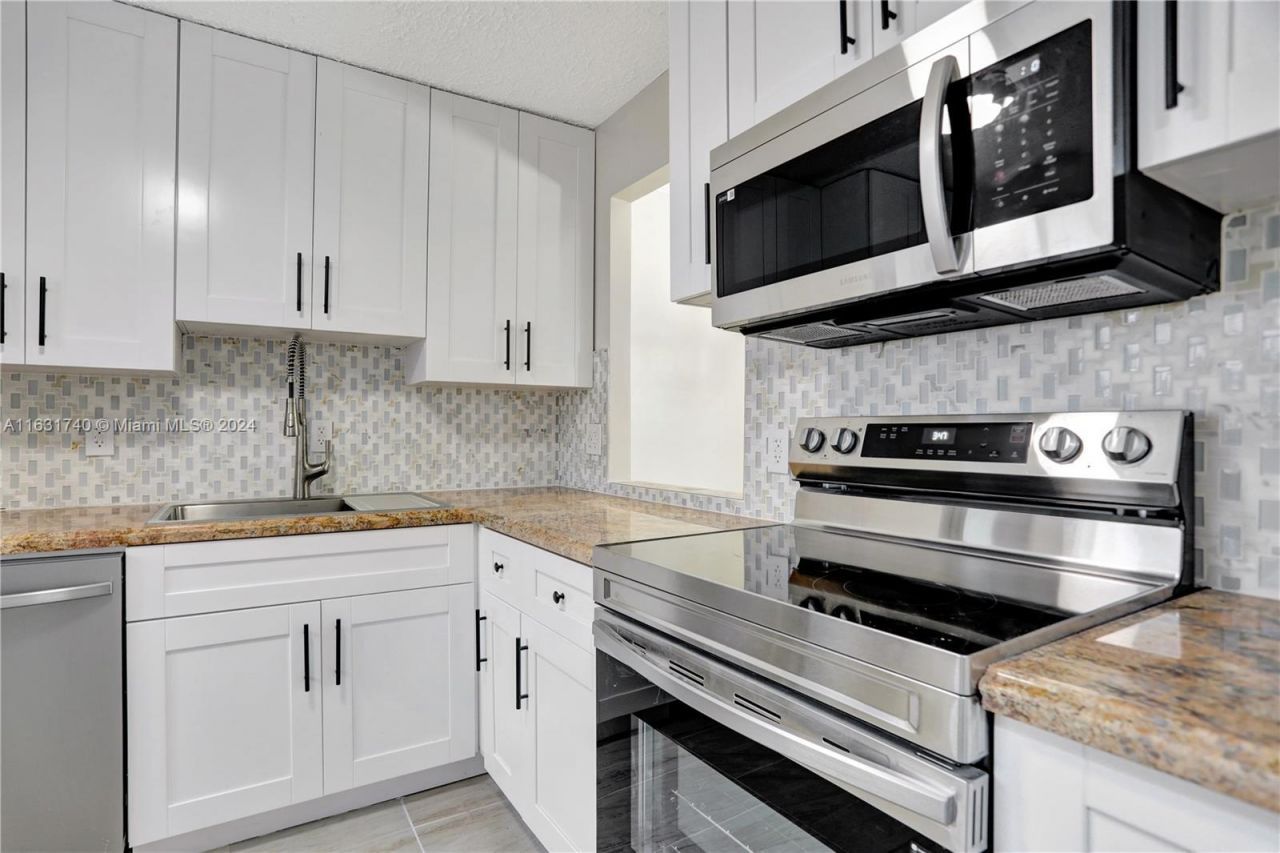 3160 Holiday Springs Boulevard, Unit 7-104, Margate, FL 33063 Photo