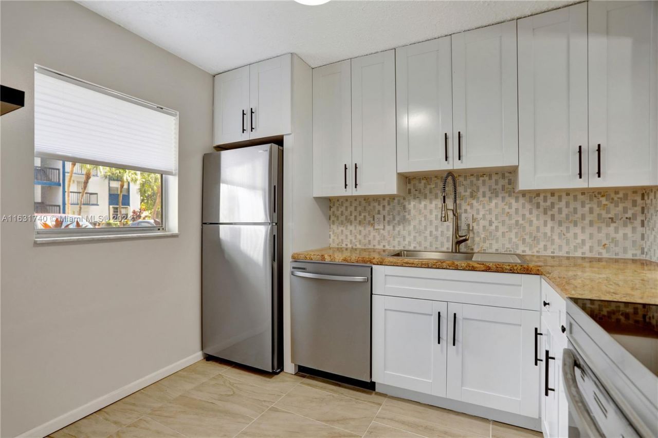 3160 Holiday Springs Boulevard, Unit 7-104, Margate, FL 33063 Photo