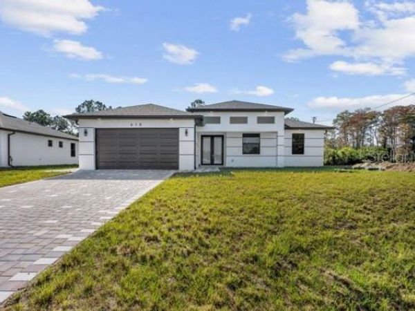 618 RAINTREE STREET E, LEHIGH ACRES, FL 33974