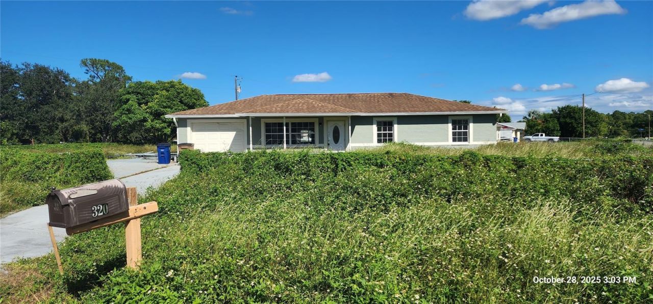 320 Plumosa Avenue, Lehigh Acres, FL 33936 Photo